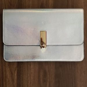 Express metallic silver clutch